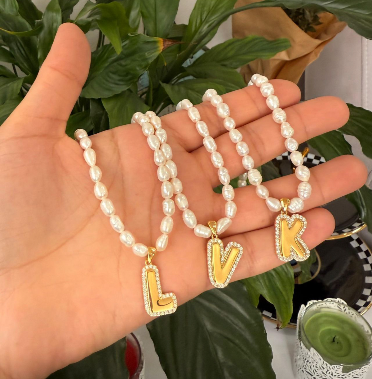 Bubble letter CZ initial necklace on a pearl strand, crafted in durable sterling silver with water-resistant, anti-tarnish finish; perfect for young girls and women who love timeless personalized jewelry